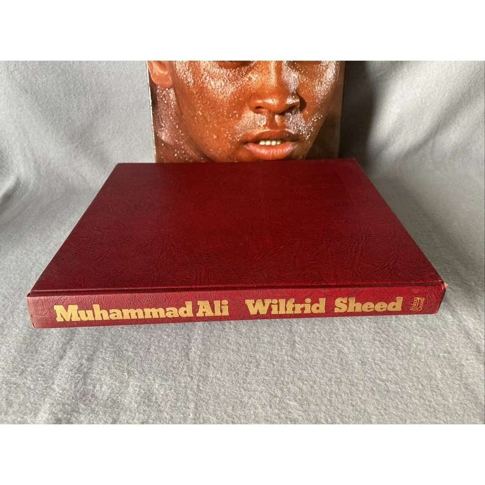Muhammad Ali: A Portrait in Words and Photographs by‎ Wilfrid Sheed ** Read**